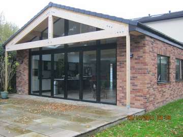 Mr S.: Hartford cheshire : 6m x 4m atrium window, 4000s Aluminium Bi folding doors with 70mm - 300s Aluminium Frames. Double glazed with Pilkington Soft coat Low E Double glazed units, argon gas filled with warm edge spacer. structural steel over capped in matching Polyester powder coated aluminium Example of aluminium triple glazed bi-fold doors. Aluminium bi-fold doors near Macclesfield SK11. Alumnus doors with 44mm triple glazing near Alderly Edge SK9. Aluminium Bi-fold doors near Wirral CH48 CH60. Alumnus Bi-fold doors triple glazed Liverpool Formby L37 near South Port PR8 Bi-fold doors near Crosby L23